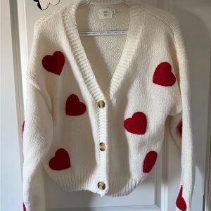 Cozy Cream Cardigan with Red Heart Accents